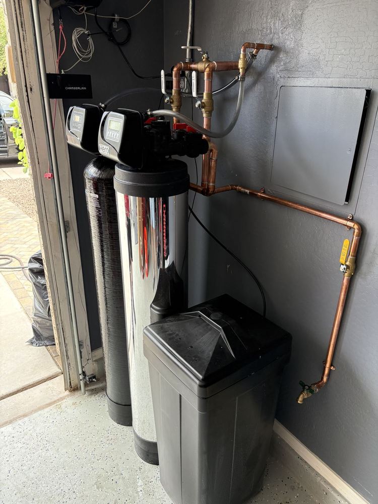 Water softener and filtration system installed in a garage