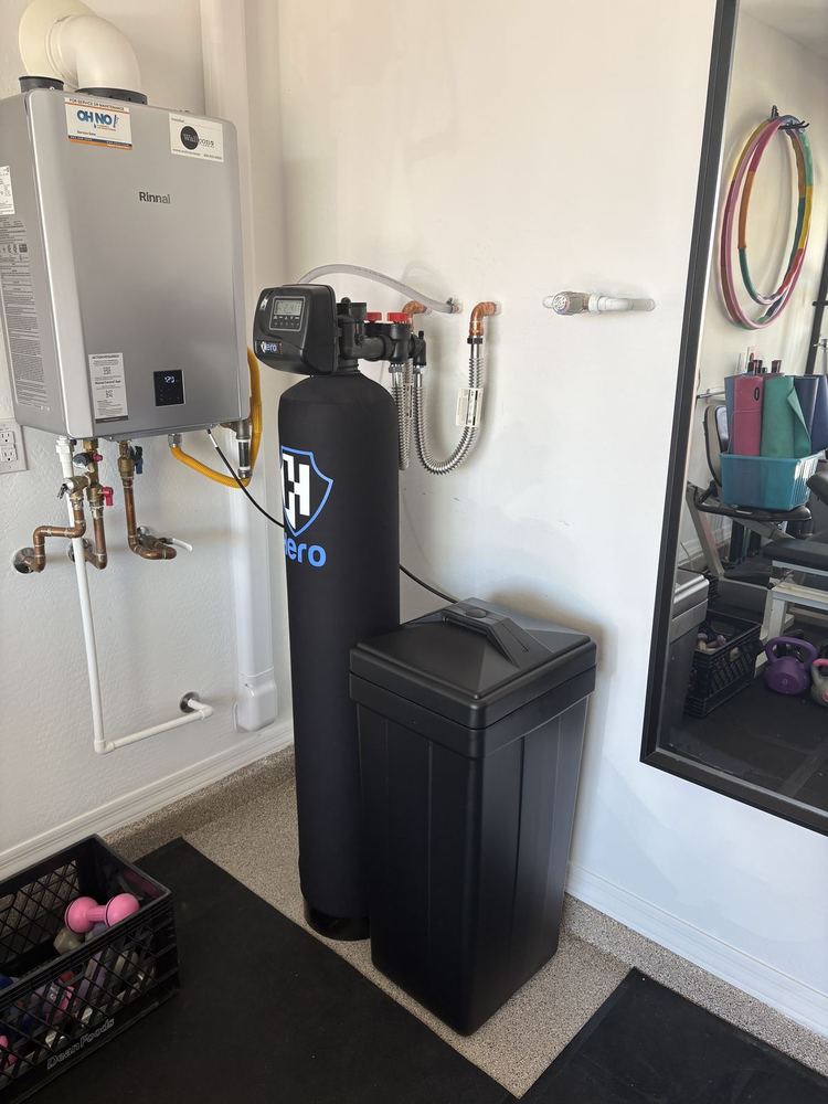 Water softener installed next to tankless water heater